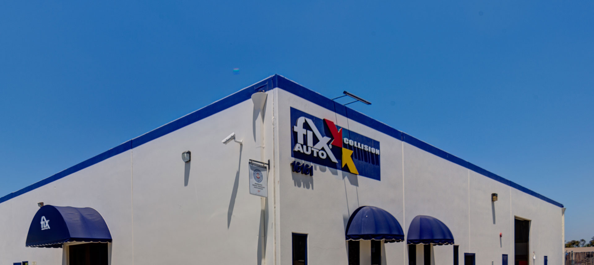 Fix Auto Irvine Auto Body Shop Sign and Building Exterior