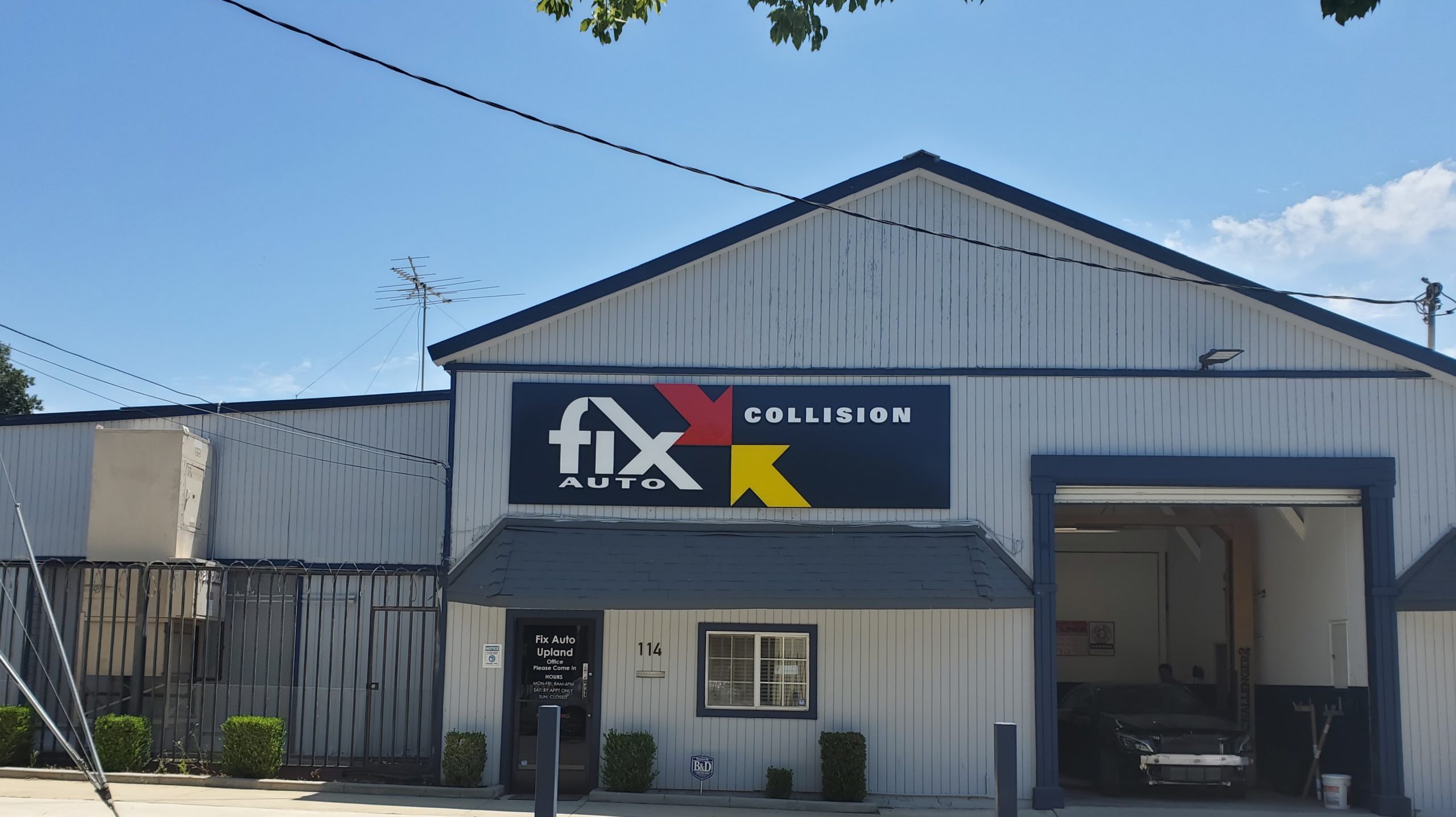 Fix Auto Upland's Building Exterior with signage