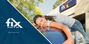 a woman leaning on a car at a collision repair shop in Rocklin CA